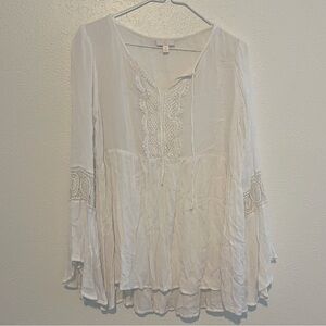 White blouse with long bell sleeves